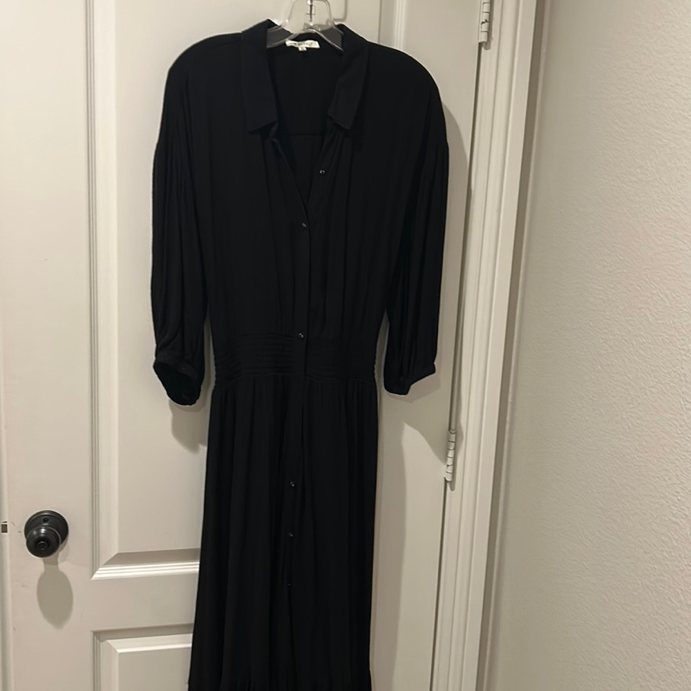 Black dress with gathered elastic ruched waist.